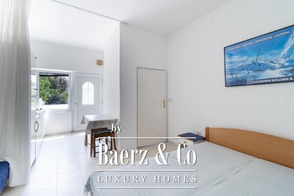 photo 9 Krk, house with three residential units and a large garden in the center